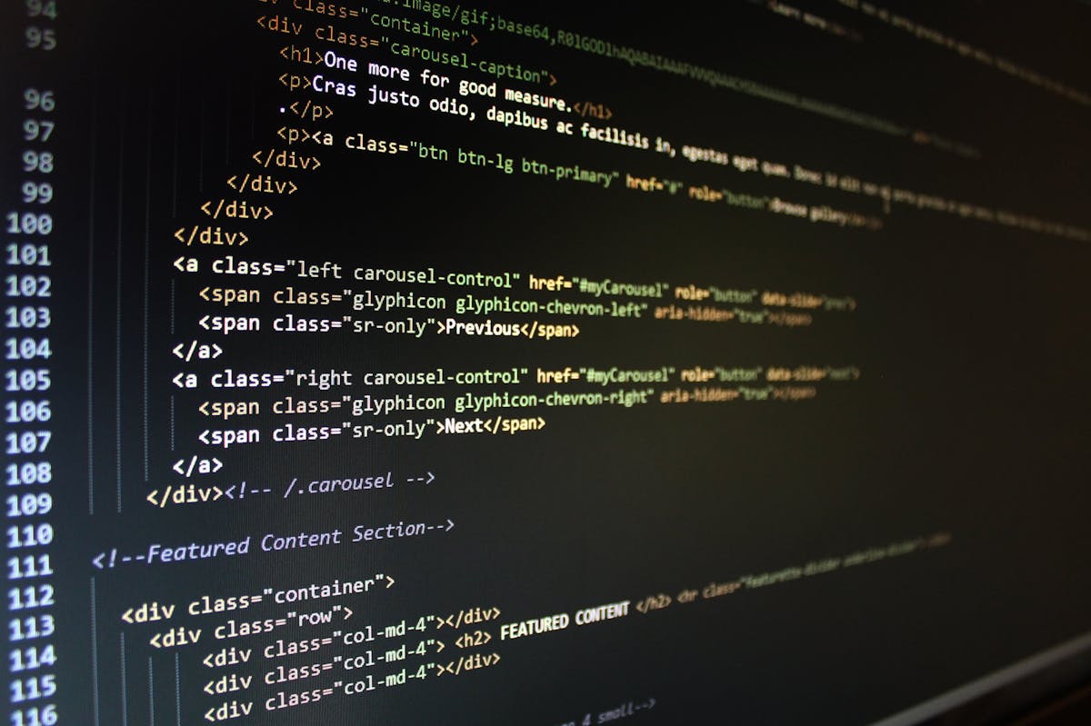 Close-up of website code on screen representing WordPress theme development during CMS migration
