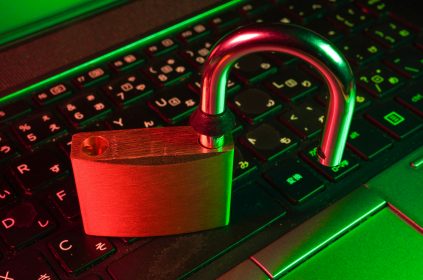 Red padlock on keyboard representing WordPress malware protection