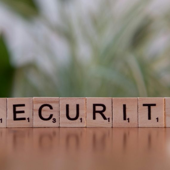 Scrabble tiles spelling Security representing WordPress vulnerability patches